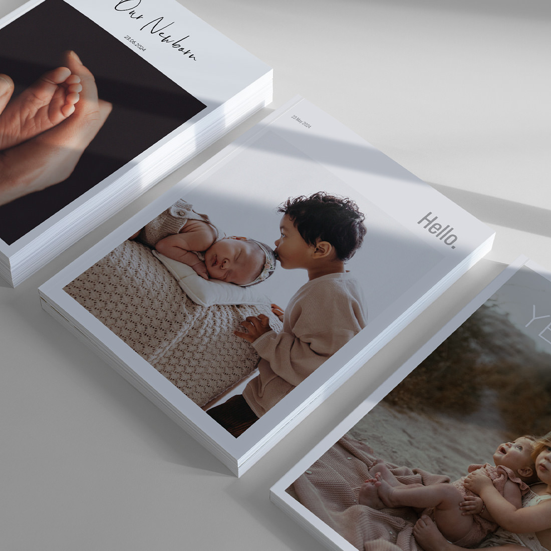 Three Baby Magazines laid out displaying cover designs