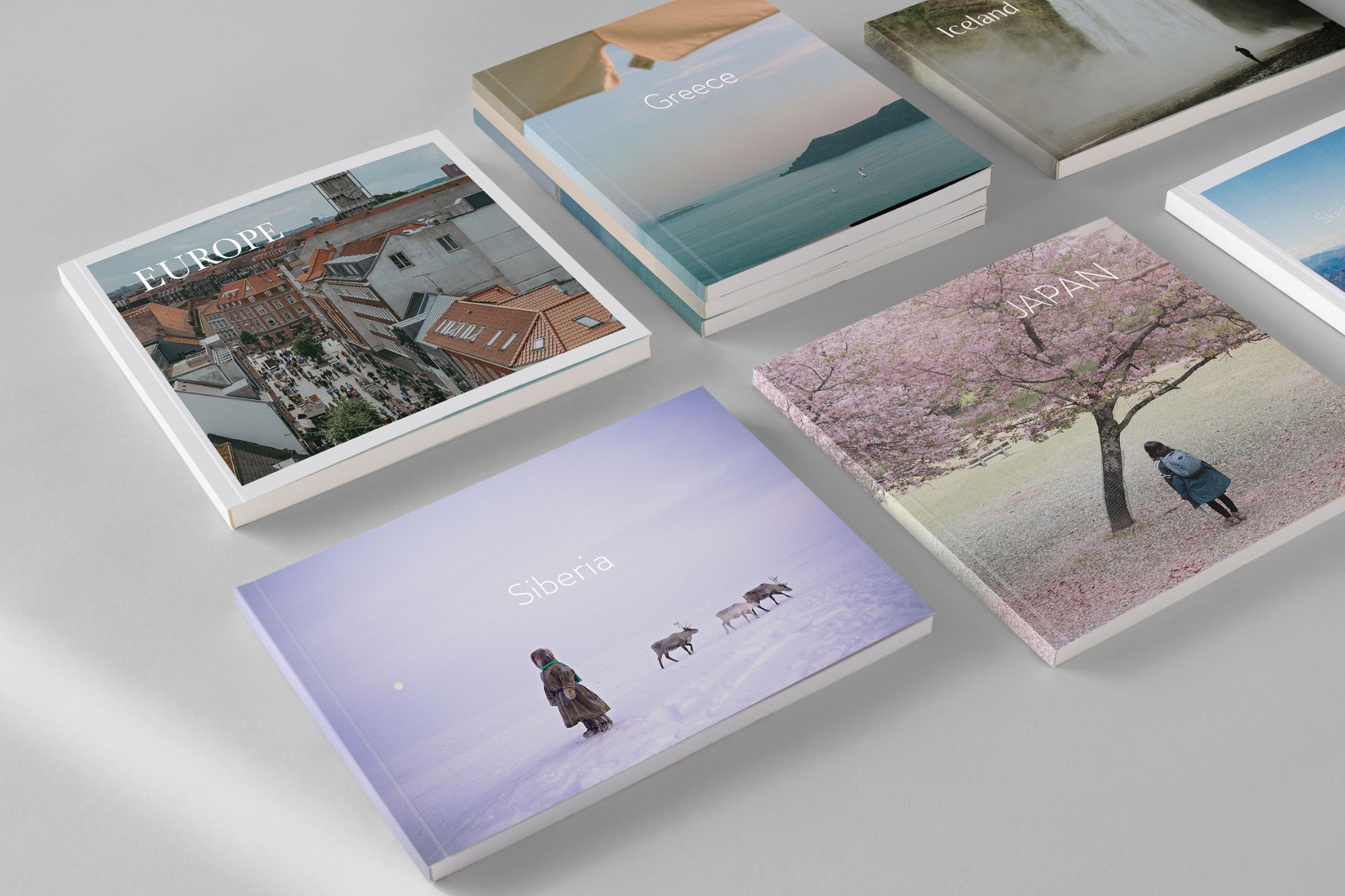 Various cinematic sites around the world featured on different types of photo albums/book covers