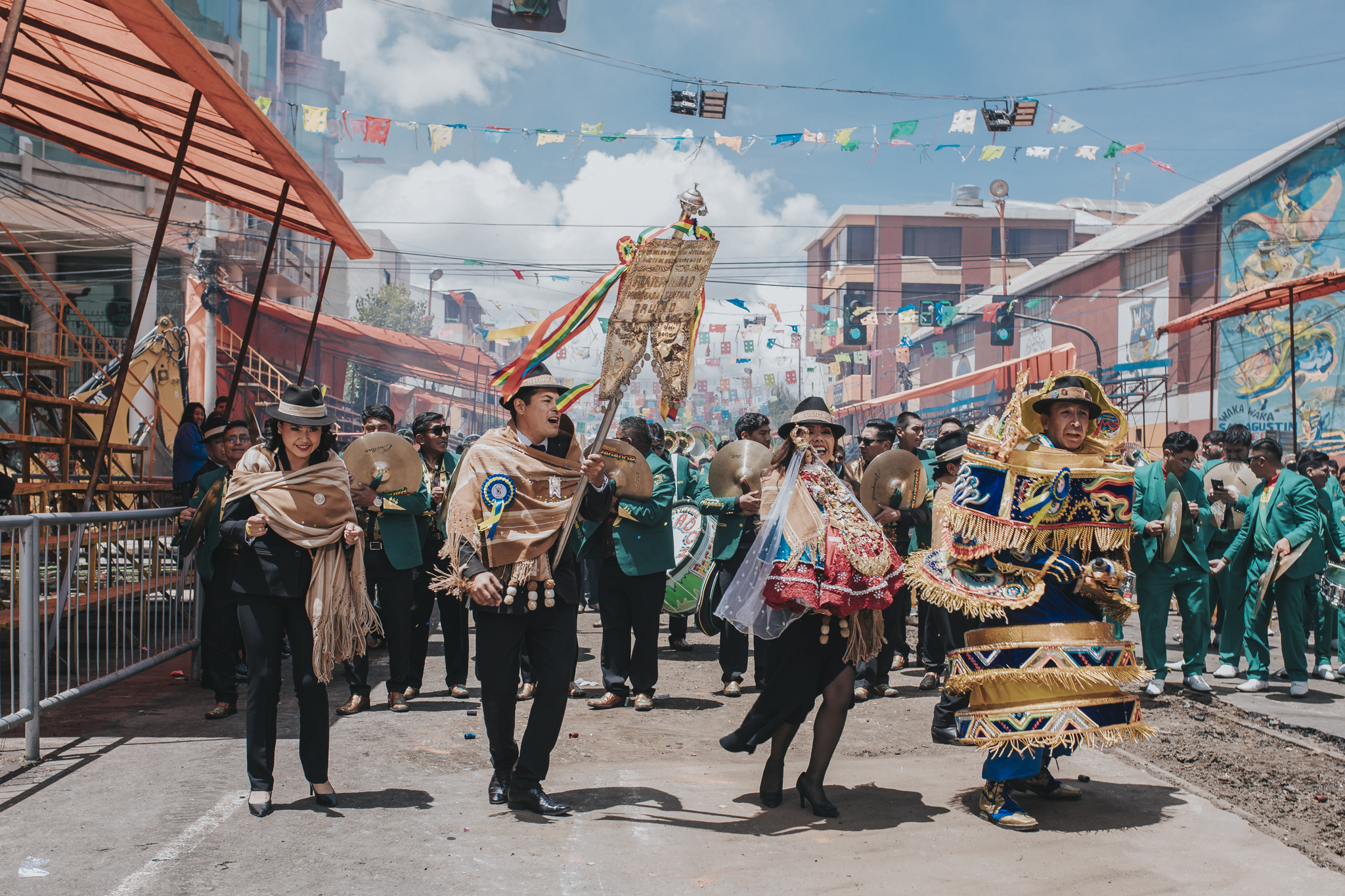 Wide view of cultural parade with vibrant colours