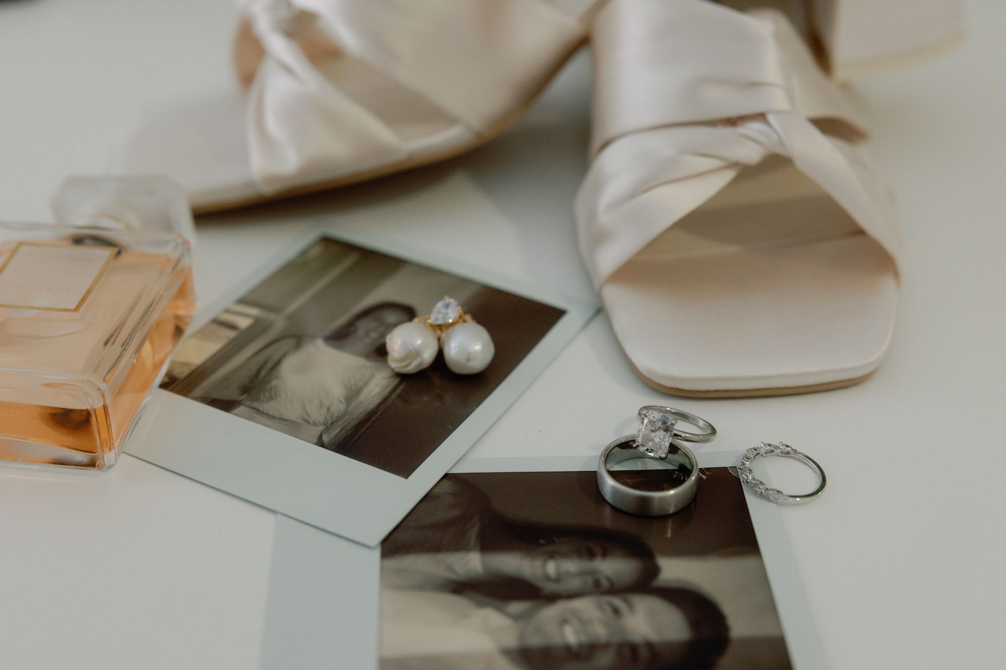 Photo of wedding accessories and polaroids