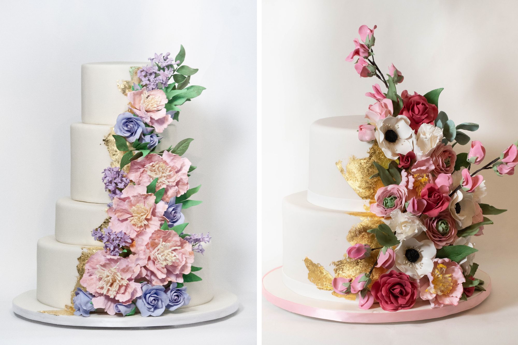 White marzipan covered tiered wedding cakes with gold leaf and colorful sugar flowers adorned around each cake.