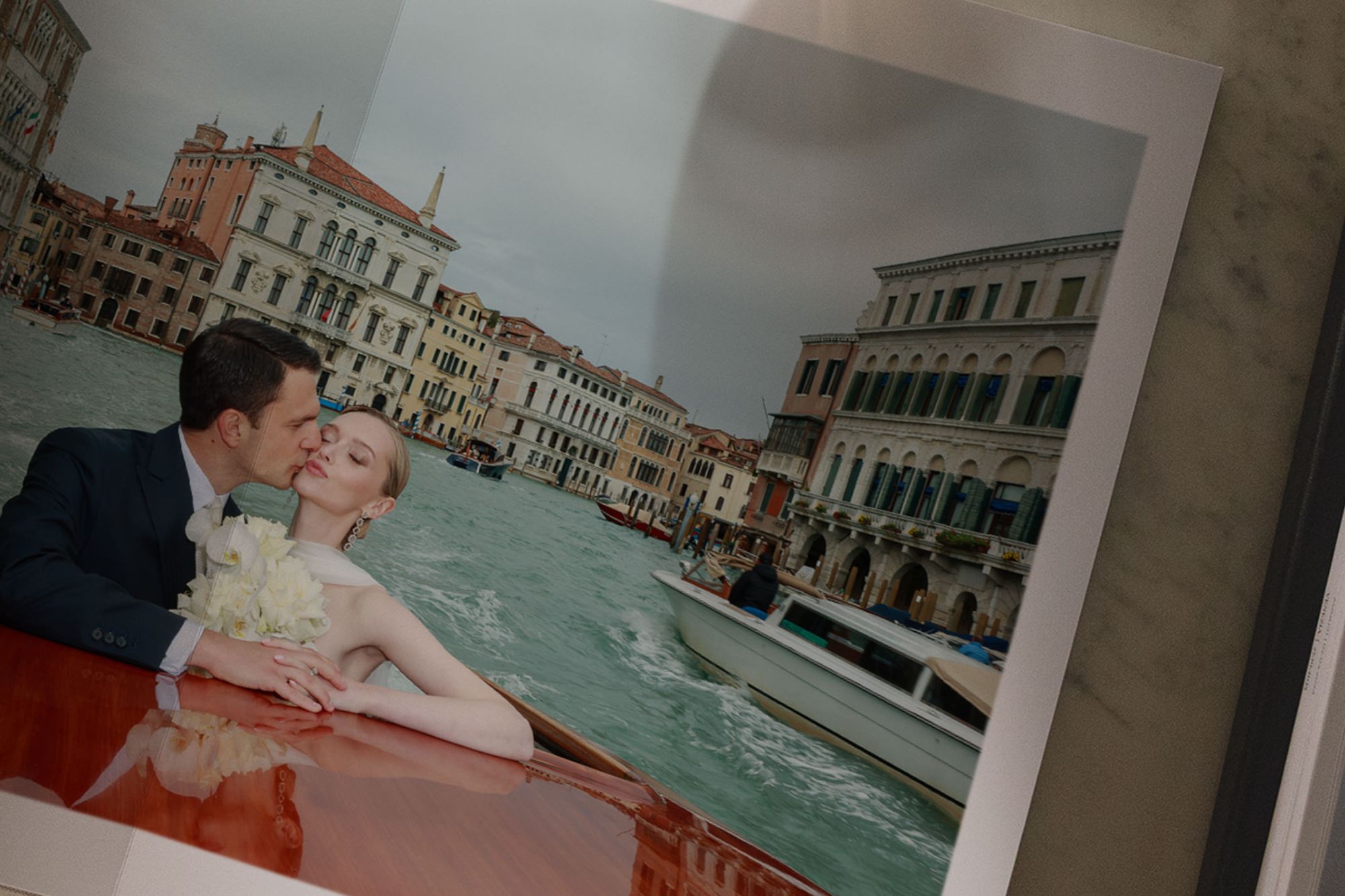 XL image of couple kissing on boat